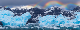 00000-1322652432-nikon_d8102C_panoramic2C_glacier2C_icebergs2C_norwegian_cruise_ship2C_rainbow.png