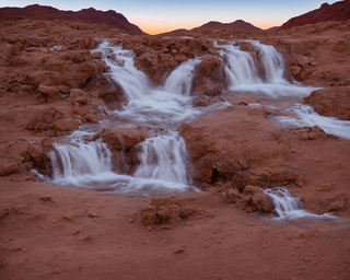 00126-25-waterfall_in_the_dessert_at_dawn.png