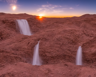 00147-30-waterfall_in_the_dessert_at_sunset.png